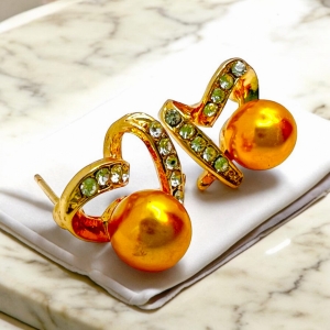 Kolczyki ze stali nierdzewnej z żółtą perełką